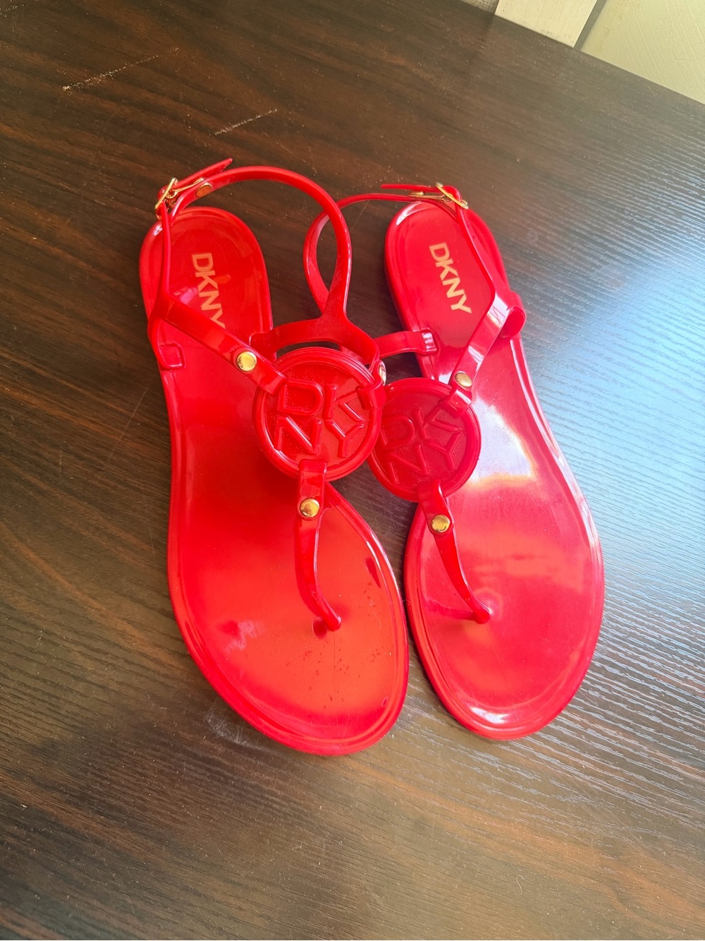 DKNY Red Jelly Logo T-Strap Sandals with Gold-Tone Accents
